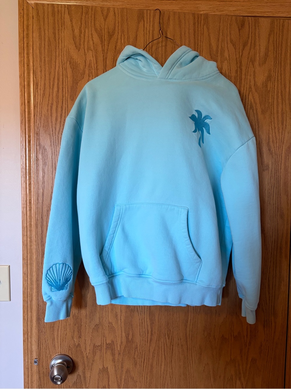 Light Blue Women's Pullover Hoodie with Palm Motif